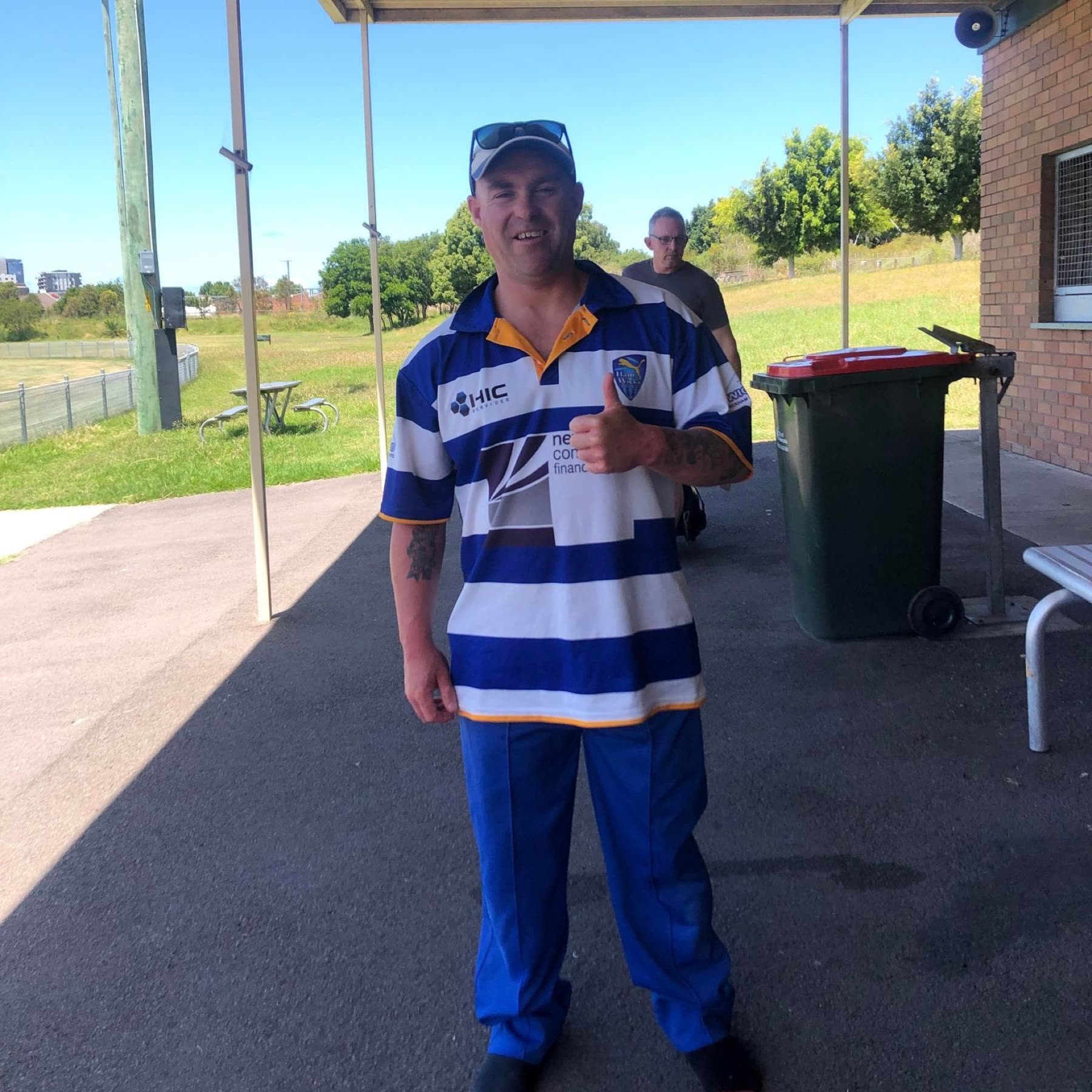 A Ham-Wicks member in the club polo giving a thumbs up at Passmore