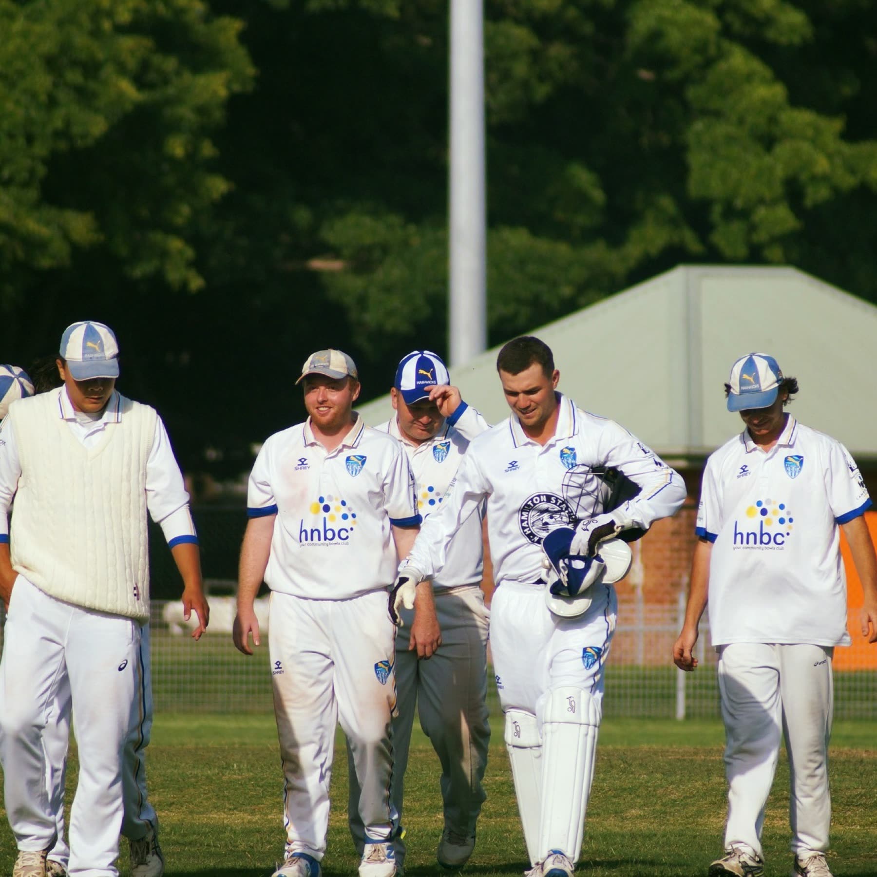 Ham-Wicks players walk off together after a day's play