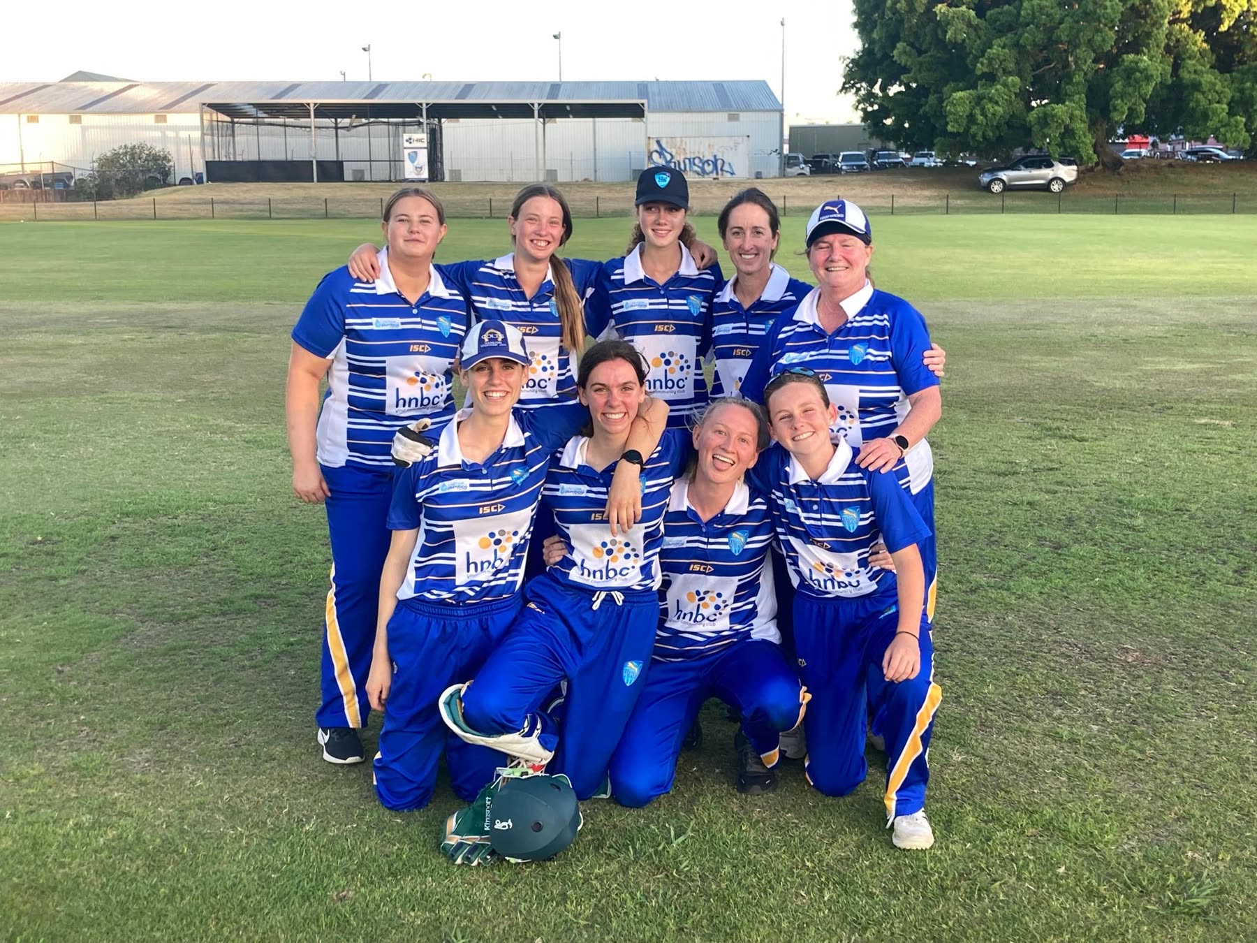 The Ham-Wicks women's side together on the field after a T20 game